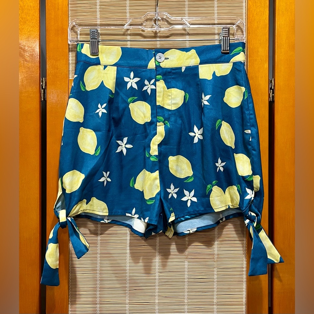 High waisted blue lemon shorts with side ties, size XS